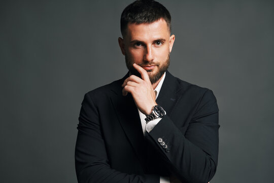Thoughtful handsome man posing in studio
