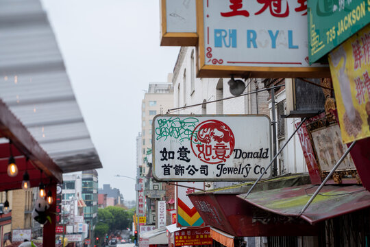 San Francisco, CA - November 05 2022 - Back alley of Chinatown in San Francisco on a rainy day with mist