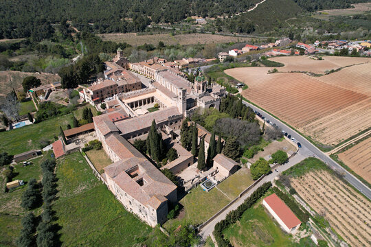 Aerial view of Santa Maria de Poblet monastery on sunny spring day. Tarragona, Spain.