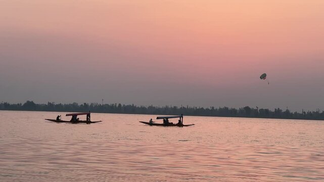 Peaceful Evening View of Dal Lake with Shikara Boats in Srinagar Kashmir India

