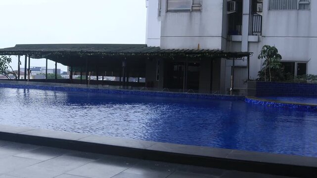 swimming pool on the 6th floor of a hotel in the city center