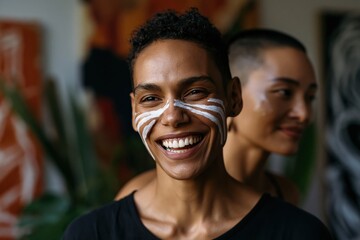 Fototapeta premium Smiling woman with white facial paint markings for portrait background and inclusive wellness campaign design
