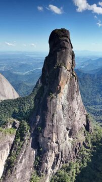 Sweeping aerial panorama of Dedo de Deus showing the dramatic Serra dos &Oacute;rg&atilde;os mountain landscape.