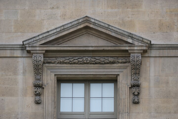 Fototapeta premium Classical/Neoclassical building façades, columns, pediments, Statues, Greco-Roman shapes and design, Ornaments... From this Architectural style inspired by Classical Antiquity. Mostly taken in Paris.