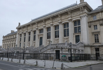 Fototapeta premium Classical/Neoclassical building façades, columns, pediments, Statues, Greco-Roman shapes and design, Ornaments... From this Architectural style inspired by Classical Antiquity. Mostly taken in Paris.