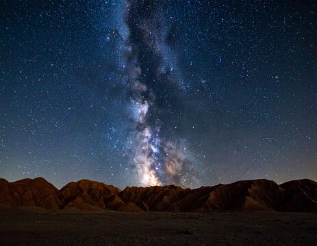 Wide-angle nightscape of the Khanan Hets syncline ridges in the Mongolian Gobi Desert. Stacked rock canyons under a brilliant Milky Way core in a crisp, pitch-black sky. Symmetrical 8k photo.