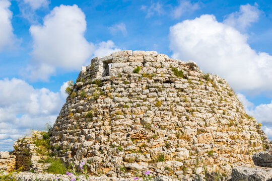 Sunny view of The Talaiot de Torell&oacute;, one of the most monumental and best-preserved prehistoric megalithic towers on the island of Menorca, Spain
