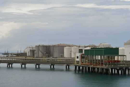 marine terminal fire protection infrastructure, pipelines and industrial storage tanks at harbor facility, safety systems and emergency response facilities support tanker operations at the petrochemic