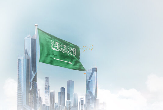Saudi Arabia flag waving with modern futuristic buildings. Saudi Arabian national flag beautifully waving in the sky.