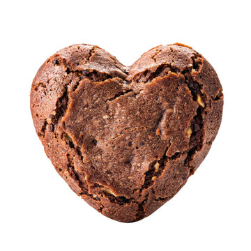 A single heart shaped chocolate cookie with a cracked textured surface isolated on a plain black background, for food concepts
