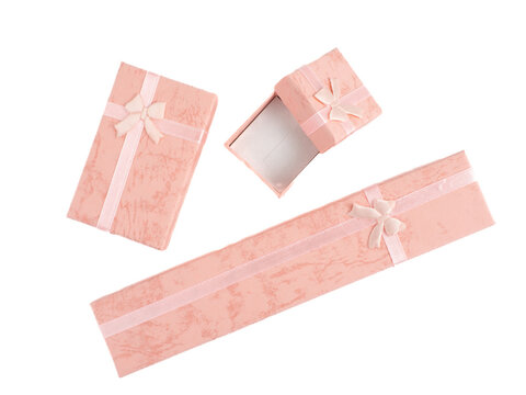three sizes of peach cardboard  jewelry boxes flat lay