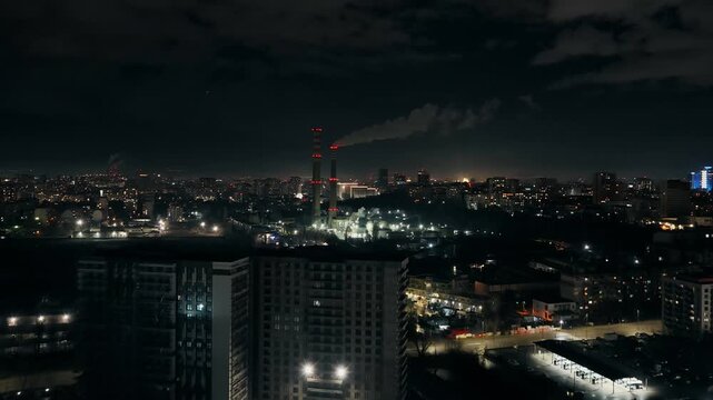Sofia Cityscape at Night with Industrial Chimney Emissions