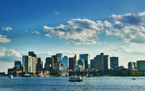 Scenic panoramic view of the Boston skyline and downtown financial district as viewed across the Boston Harbor., Boston, Massachusetts, New England, United States