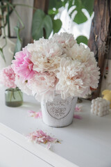 A bouquet of lush, delicate pink peonies © Olga Tkacheva