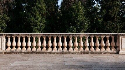 Naklejka premium Elegant stone balustrade defining a formal garden terrace, overlooking dense green trees under warm, natural daylight