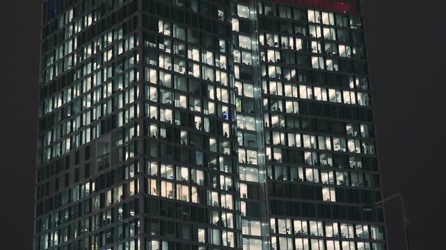 Modern Office Building in Warsaw at Night: Urban Business Hub