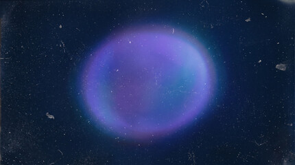 Fototapeta premium Circular purple and blue nebula lens flare on grainy dark background.