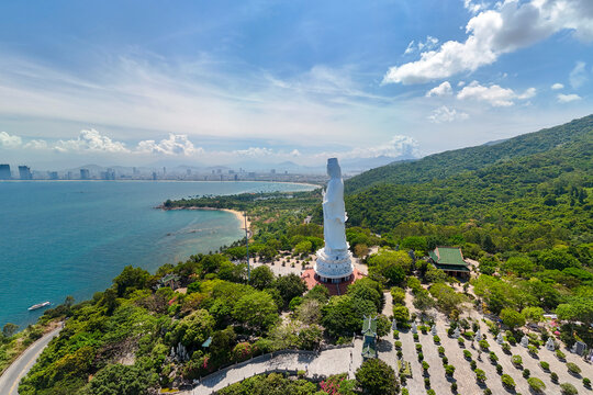 White Buddha statue Lady Buddha at Linh Ung temple Pagoda, Danang, Vietnam in a summer day