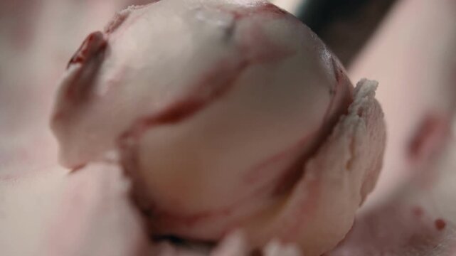 Strawberry ice cream scoop, close up of pink fruit gelato texture, creamy frozen dairy dessert being served, gourmet berry sorbet swirl