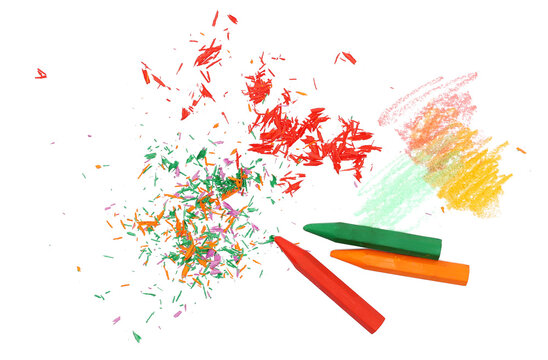 colorful wax pastel with scribble and shavings, isolated on white background, top view	