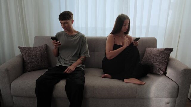 Digital disconnection. Couple spending time on smartphones instead of talking, modern relationship crisis, screen addiction, emotional neglect and social media dependence