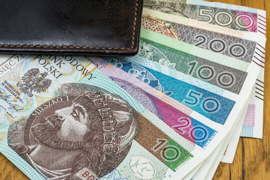 Polish zloty banknotes in leather wallet