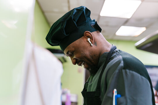 Happy Chef in Professional Kitchen