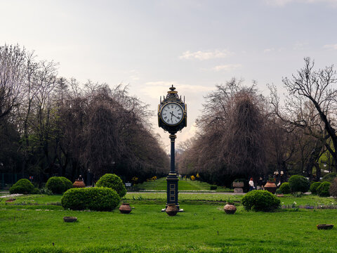 Vintage park clock standing in Cismigiu Gardens, Bucharest