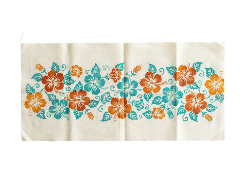 Vibrant orange and teal floral pattern on a folded white fabric