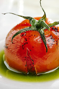 whole roasted tomatto in herbal oil 