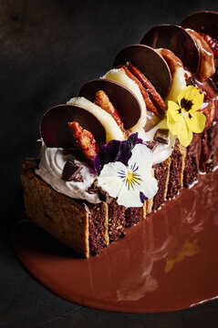 Fine dining chocolate dessert with edible flowers