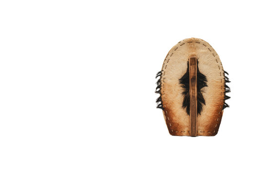 A close-up shot of a brown leather moccasin shoe with laces on a white background.