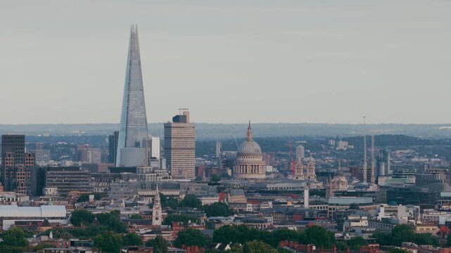 Long lens aerial view of the Shard and St. Pauls cathedral in London captured at sunset