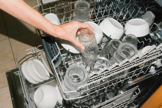 Unloading Dishes from Dishwasher