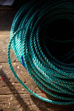Ropes in different patterns laid out on a dark surface