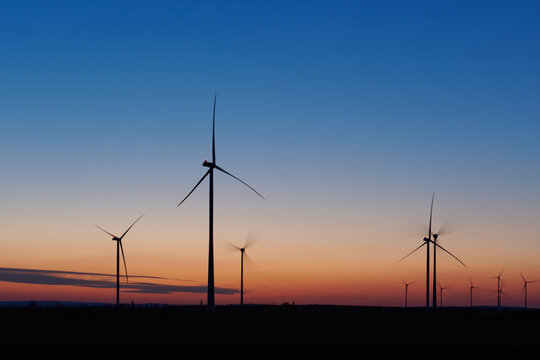wind park under fading twilight sky