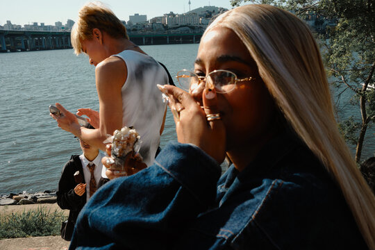 Friends spending time together by Hangang River in Seoul