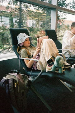 Stylish Young Girl  tablet computer wait Airport Travel film 