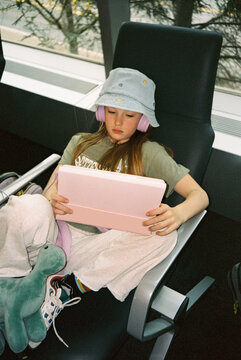 Style Young Girl On tablet computer wait Airport Travel film 