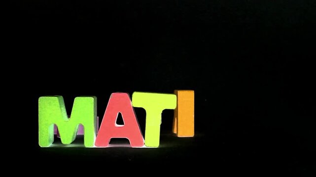 The word matrix with wooden letters 