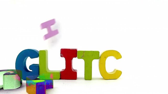 Glitch in the matrix with painted wooden letters 
