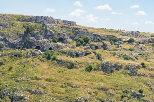 Rock‑cut caves and ancient dwellings in the Murgia Timone area,  part of the UNESCO‑listed Murgia Materana landscape, Matera, Province of Matera, Basilicata, Lucania, Italy  