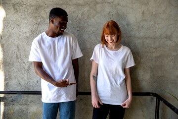 Diverse friends wearing casual tees.