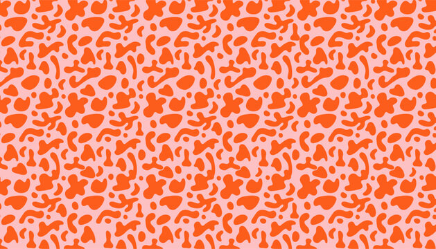 Abstract organic blob seamless pattern background with bright orange liquid shapes on pink.