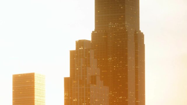 Tall buildings are seen against a bright sunset sky. The colors reflect off the glass, showing a busy city environment. This scene takes place in the evening.