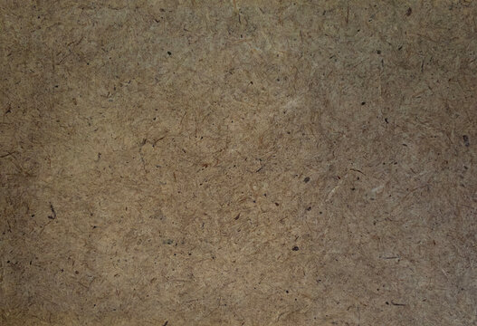 Natural recycled paper texture background with organic fiber details