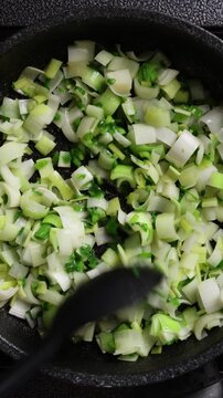 Stirring Vegetables Close Up Top View Vertical
