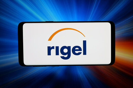 Stuttgart, Germany - 06-12-2026: In this photo illustration, the logo of US biotech company Rigel Pharmaceuticals Inc. is displayed on a smartphone in front of abstract background on computer screen.