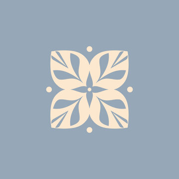 Floral ornament featuring four stylized petals with intricate leaf-inspired