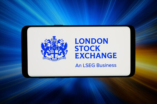 Stuttgart, Germany - 06-12-2026: In this photo illustration, the logo of financial market London Stock Exchange (LSE) is displayed on a smartphone in front of abstract background on computer screen.